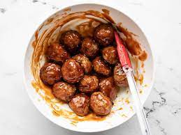 BBQ MEATBALLS WITH CHEESE GRITS